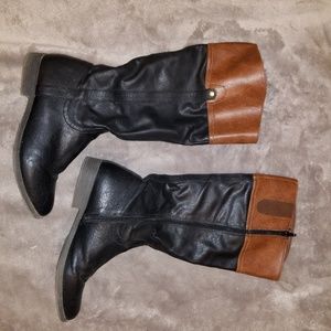 Black and brown tall boots